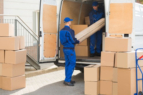 Professional packers organizing a move in West Hampstead